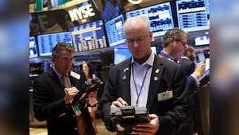 Wall Street rally loses steam after report on coronavirus drug trial; main US stock indexes trim gains