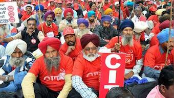 Trade unions stage protests against suspension, tweaking of labour laws by some states during lockdown