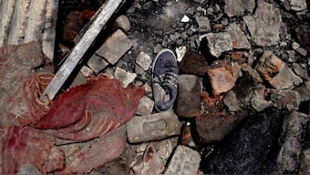 In locked-down Kashmir, an upsurge in COVID-19 cases — and violence in civilian neighbourhoods