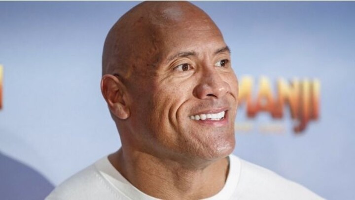 Watch: Dwayne Johnson gifts his custom truck to Navy veteran at Red Notice screening