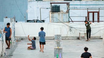 Rooftops as an antidote to the lockdown: A photographer documents people's shared joys, closeness on terraces