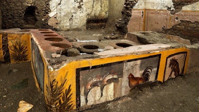 Food stall unearthed at Italy's Pompeii reveals new clues about snacking habits of ancient Romans