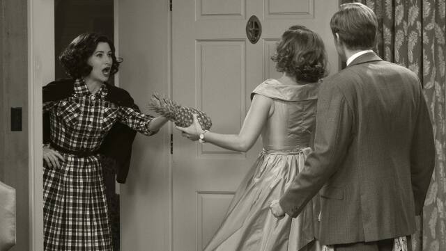 Kathryn Hahn plays the nosy neighbour, Agnes