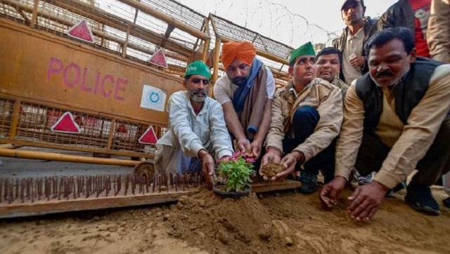 Farmers plant flowers at Ghazipur protest site in response to Delhi Police's 'iron nails'