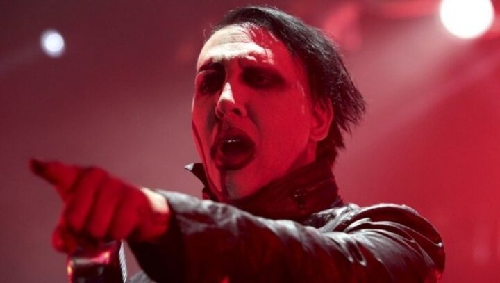 Arrest warrant issued against Marilyn Manson in assault case; singer denies charges