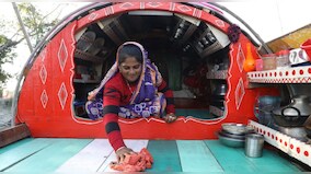 In Bangladesh, a fishing community lives in a boat village, dissociated from mainland, government assistance