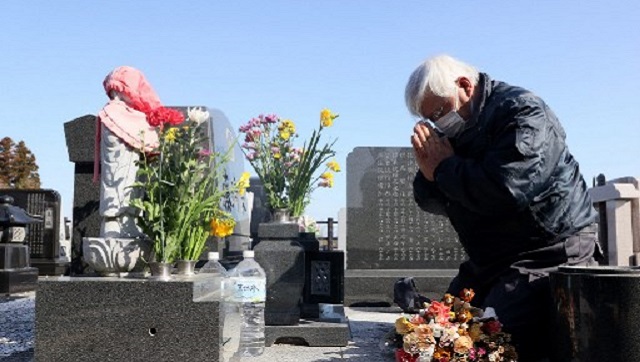 Japan marks 10 years of Fukushima disaster; PM Yoshihide Suga says country overcame tragedy 'with courage' Japan marks 10 years of Fukushima disaster; PM Yoshihide Suga says country overcame tragedy 'with courage'