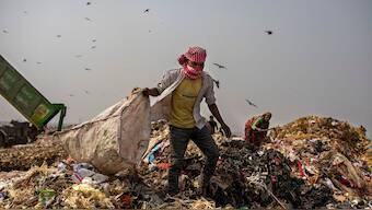 As COVID-19 vaccination drive revs up across globe, scavengers, trash collectors in urban centres struggle for access to shots