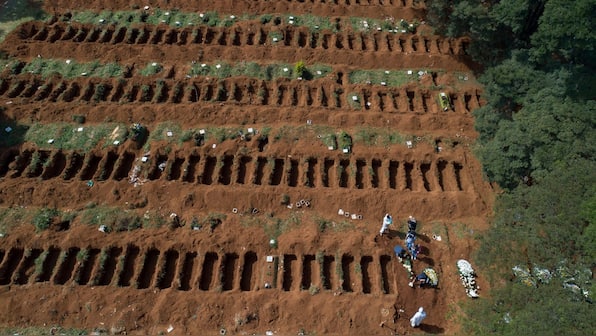 As COVID deaths cross 3 million globally, a look at the pandemic's most defining images