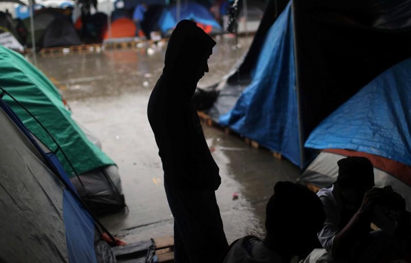 Central American migrants protest closure of Tijuana shelter Central American migrants protest closure of Tijuana shelter