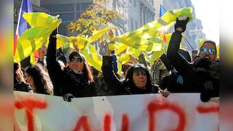 Clashes erupt in Paris as 'yellow vests' protest at unrepentant Macron