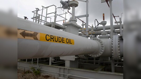 U.S. oil prices edge up on trade talk hopes, OPEC cuts