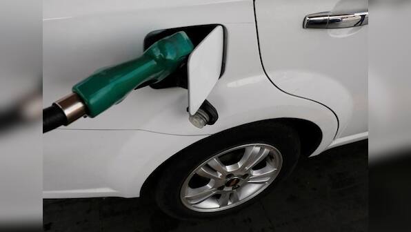 Oil prices edge down as U.S. fuel stockpiles grow more than expected