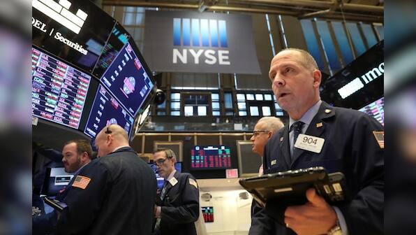 Health, defense stocks help Wall St. grind higher