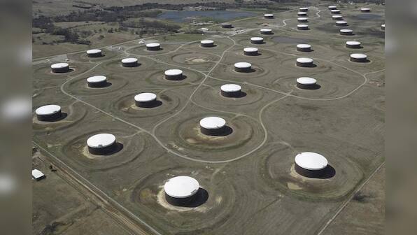 Oil edge up as investors latch on to OPEC cuts, supply outlook