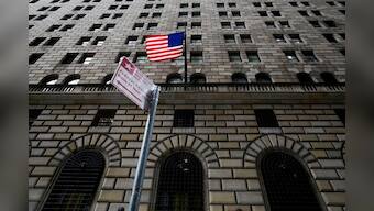 Corrected-Global Economy: Central bank policy tightening: damned if they do, damned if they don't