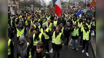 French 'yellow vests' defy Macron with fresh protests