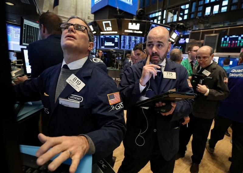 Wall Street edges lower on tech retreat trade concerns