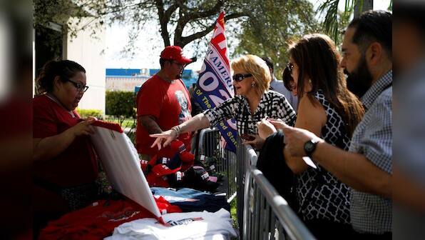 Trump seeks to shore up evangelical support at 'prosperity gospel' church