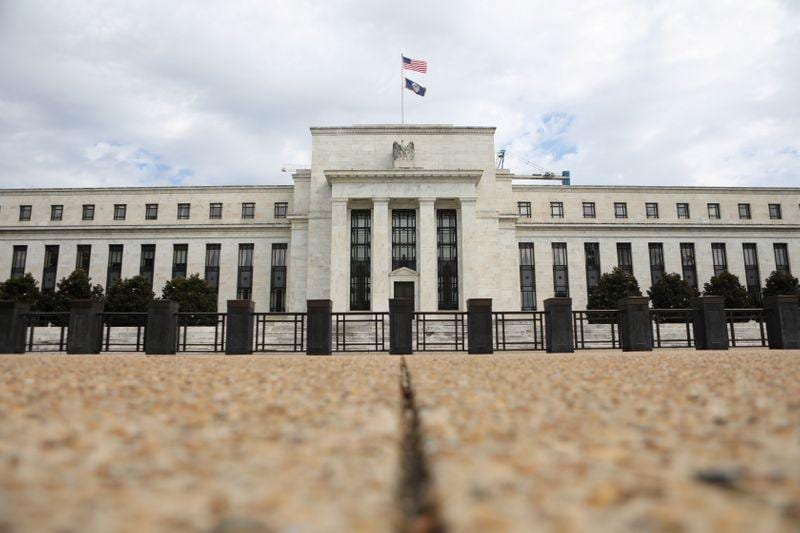 Fed sees US economy on track Trump renews Fed gripes