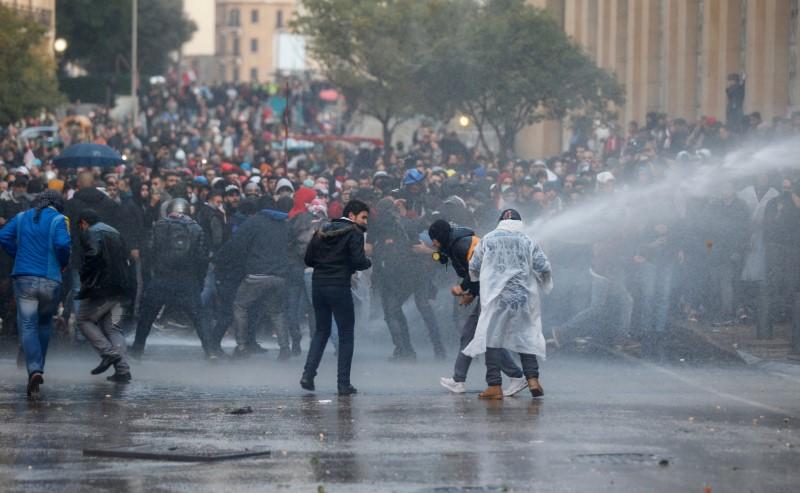 Lebanon security forces face off against protesters near parliament building