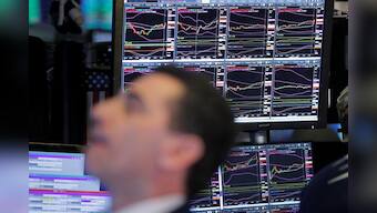 Wall Street drops as virus stokes economic concerns