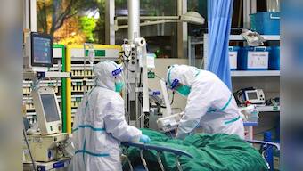 Britain lifts risk level from coronavirus to medium from low
