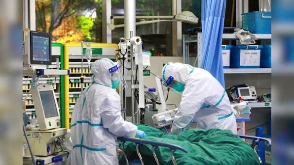 Britain lifts risk level from coronavirus to medium from low