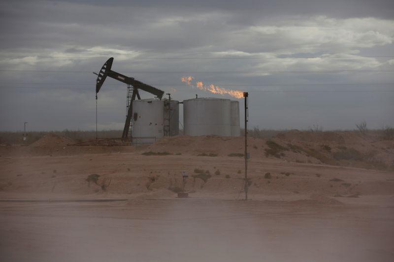 Oil up about 1 bbl set for weekly gain on Saudi output cut