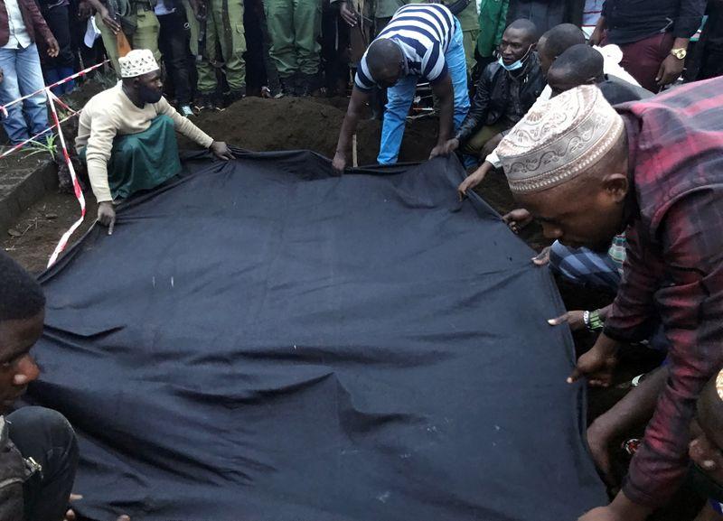 Guardians of Congos gorillas unbowed as ambushed colleague is buried