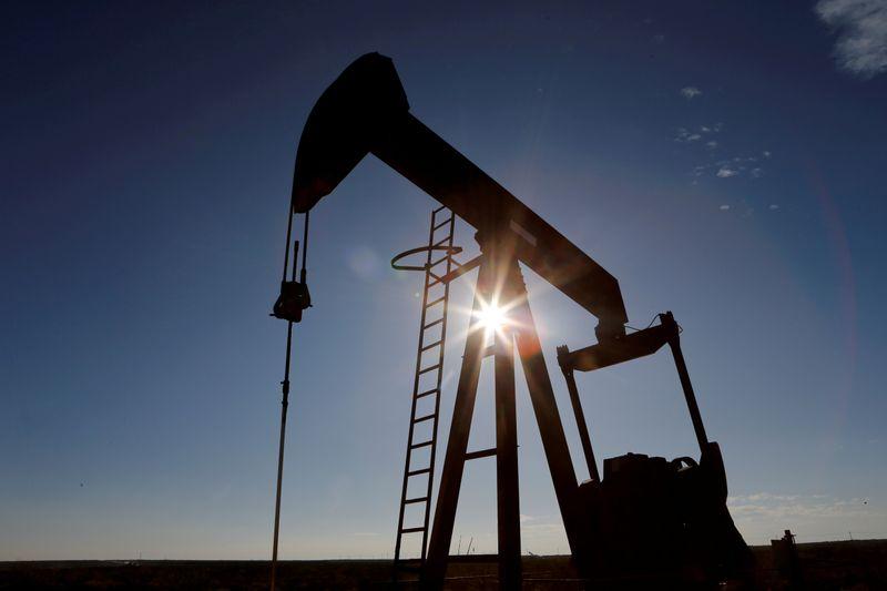 Oil settles up near 57 on tight supply expectations