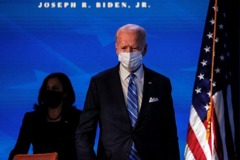 Biden says will enlist retired doctors order more syringes to speed US COVID19 vaccinations
