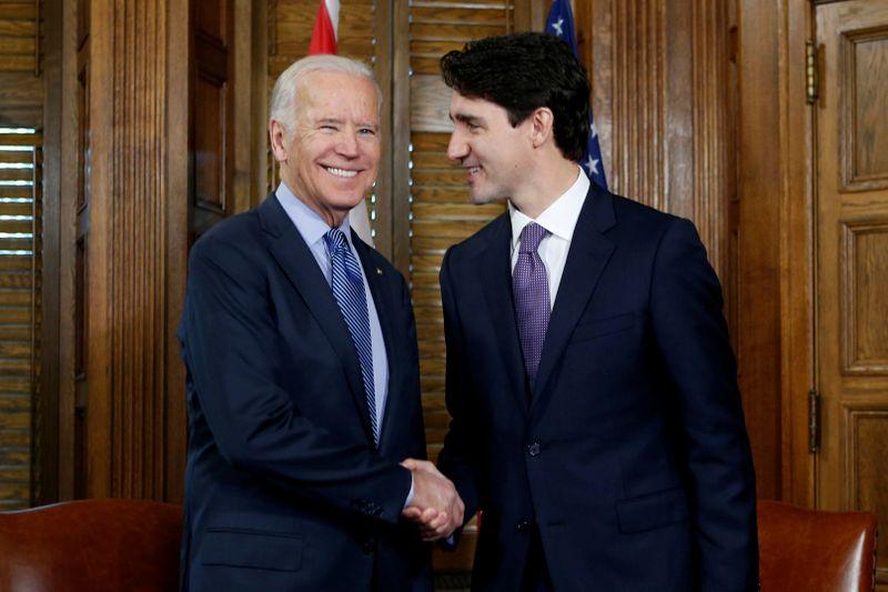 Canadas Trudeau embraces Biden in bid to turn page on Trump era