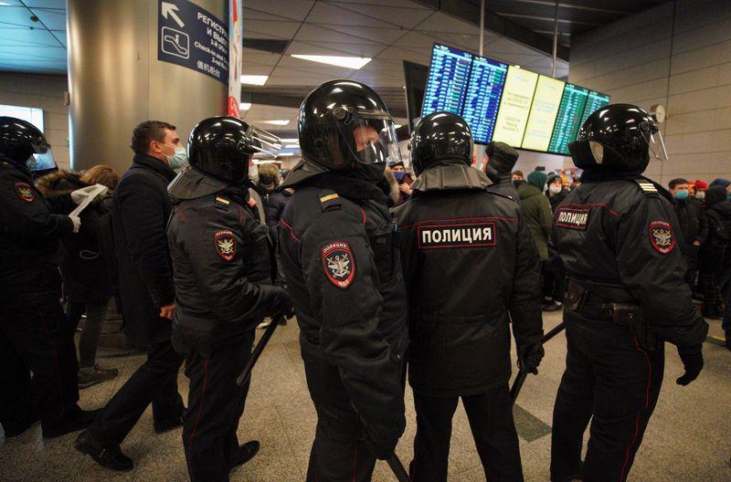 Russian police clear airport of Navalny supporters make detentions
