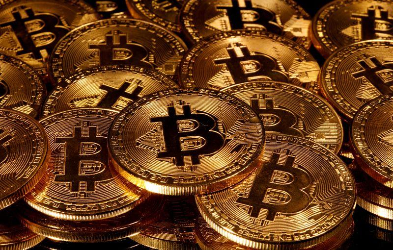 Bitcoin extends slide, sheds 5% in Asia