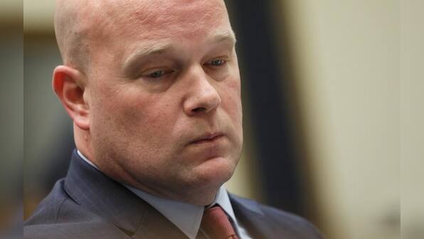 Whitaker says did not previously discuss Russia probe with Trump, associates