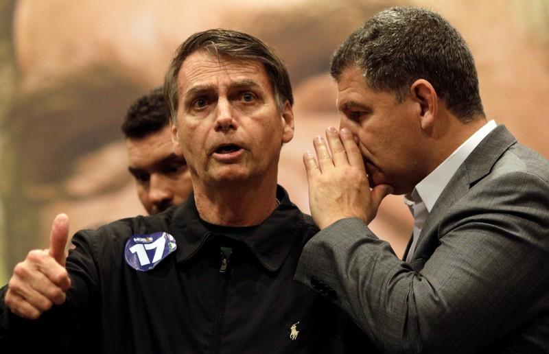 Brazils Bolsonaro confronts cabinet scandal as pension debate nears