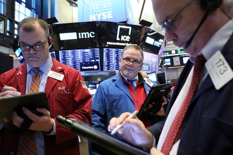 Wall Street gains on USChina trade optimism Trump declares emergency