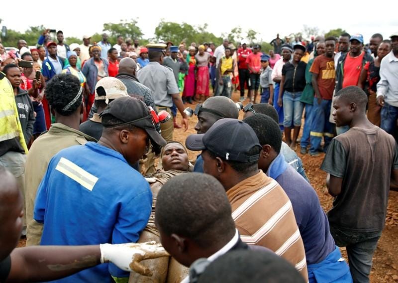 Zimbabwean rescuers pull 22 bodies from mine eight more found alive