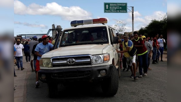 As tensions over aid rise, Venezuelan troops fire on villagers, kill two