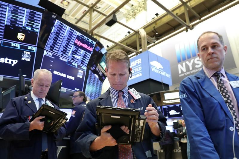 Indexes end higher as Trump says trade deal near