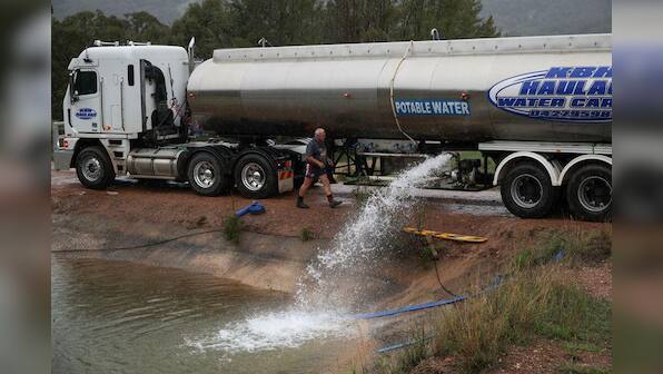 Rains mock drought-stricken Australian town as climate risks hit home