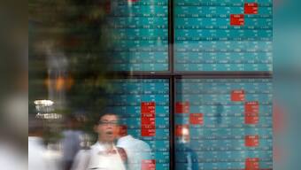 Asian stocks, Treasury yields fall as pandemic fears intensify