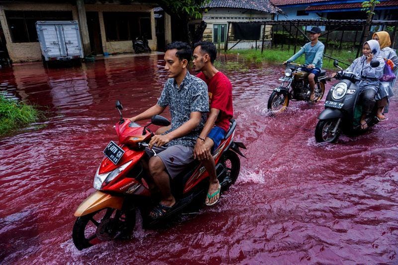 Indonesian village turns red as floods hit batikmanufacturing hub