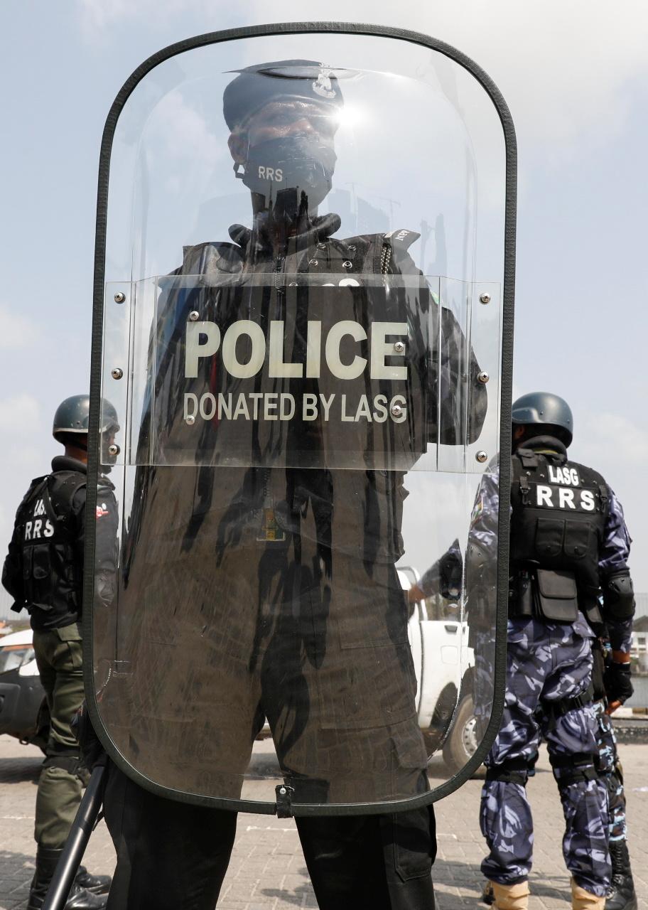 Nigerian police beat arrest protesters at site of Lekki shootings  witnesses