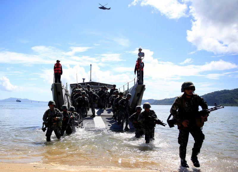 Philippines wants more than loose change for US troops deal
