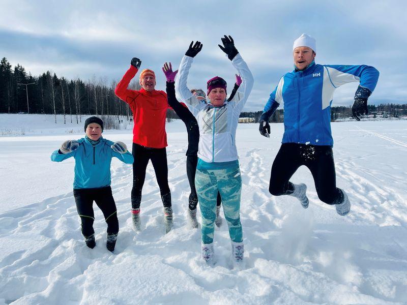 Weary of COVID restrictions Finns take up running in deep snow in socks