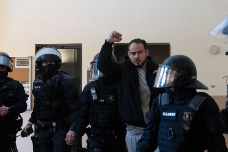 Spanish police storm university arrest rapper convicted in free speech case
