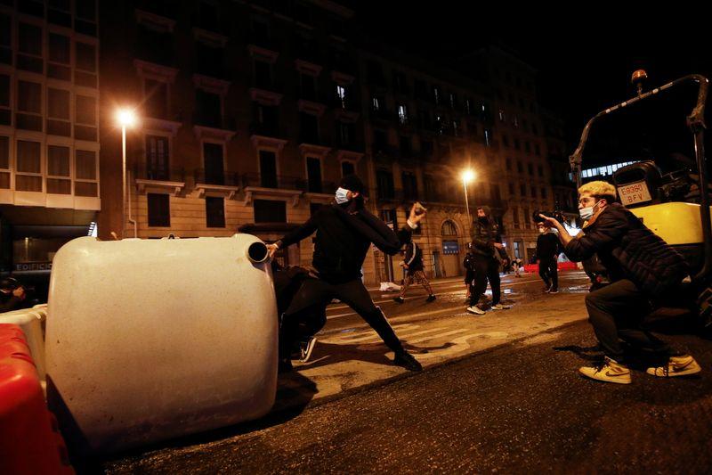 Barricades burn in Spanish streets amid protests over jailed rapper