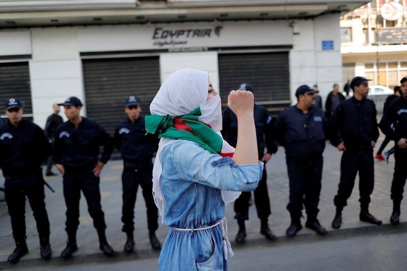 Algerians celebrate as Bouteflika abandons plan to seek new term